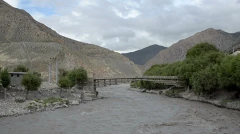 Full-flowing mountain Nepal river Stock Footage 8569525
