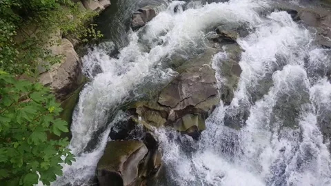 A full-flowing mountain river and green tree Stock-Footage 300382075