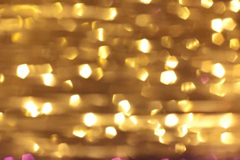 Full frame abstract gold background with bokeh Stock Photos