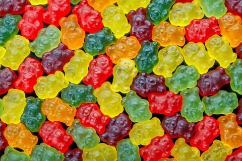 Full-frame background and texture pattern of colorful jelly bears laid closely Foto stock