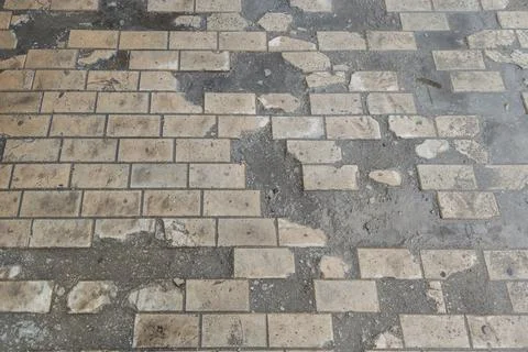 Full-frame background and texture of damaged brick pavement Stock Photos
