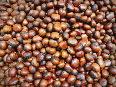 Full Frame Background of Brown Roasted Chestnuts Stock Photos