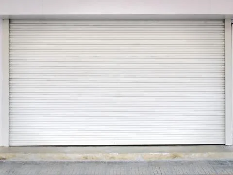 Full Frame Background of Closed White Corrugated Shutter Door Stock Photos