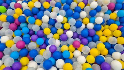 Full-frame background of colorful plastic balls in a ball pit viewed from above. 스톡 사진