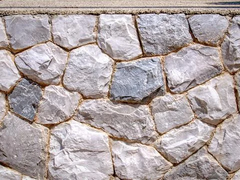 Full Frame Background of Decorative Rock Wall Texture Stock Photos
