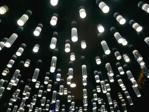 Full Frame Background of Decorative Transparent Cylindrical Lamps Foto stock