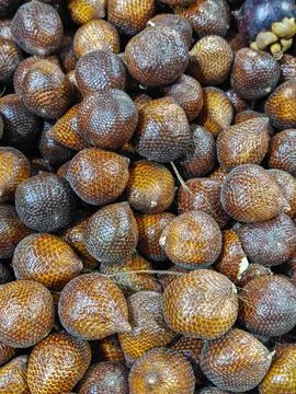 Full Frame Background of Fresh Snake Fruit Salak Harvested in Market Stock Photos