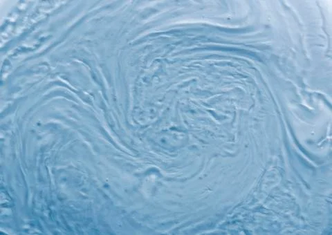 Full frame background liquid textured swirls. Stock Photos
