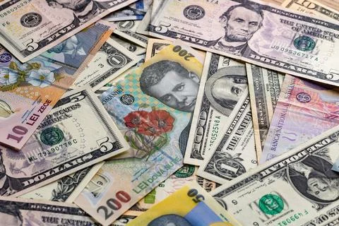 Full Frame Background of Mixed Romanian Leu and US Dollar Banknotes Stock Photos
