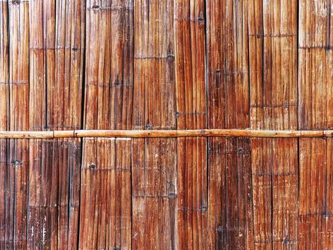Full Frame Background of Old Brown Bamboo Fence Foto stock