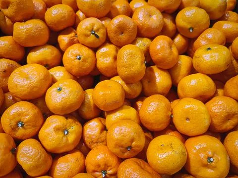 Full Frame Background of Pile of Orange Fruits Stock Photos