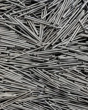 Full frame background showing lots of metallic nails Stock Photos