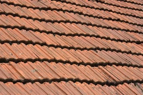 Full frame background texture of weathered red clay roof tiles Stock Photos