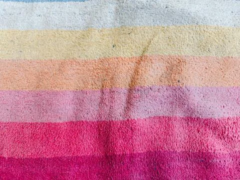 Full frame background texture of a worn fabric towel Stockfoto's