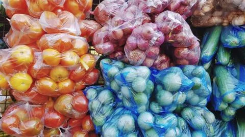 Full Frame Background of Various Kinds of Colorful Vegetable in Plastic Bags Stock Photos