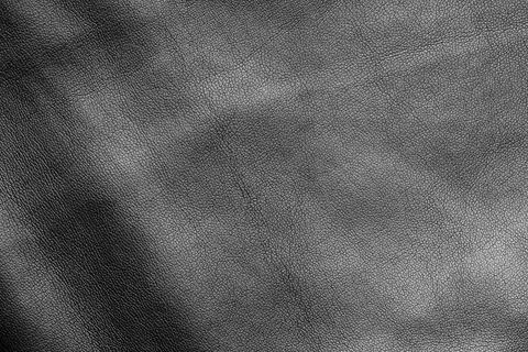Full frame of black leather texture as a solid background Foto stock