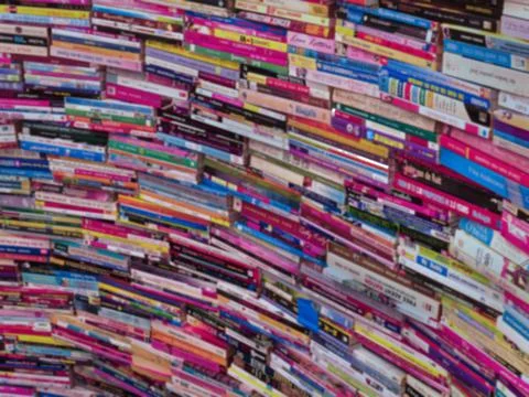 Full Frame Blurred Background of A Lot of Curved Stacked Books Stock Photos