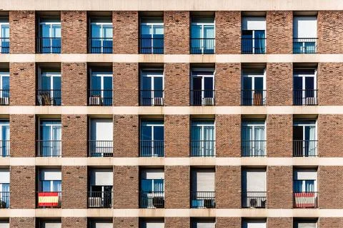 Full frame of brick facade of residential building with array of rectangul... Fotos de archivo
