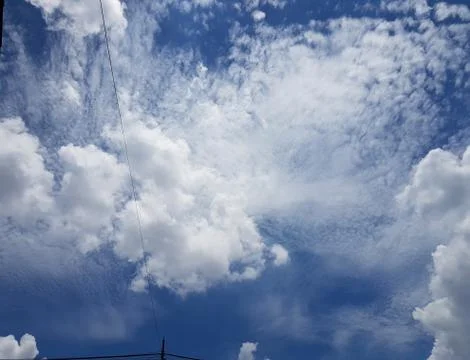 Full frame of cirrocumulus clouds over blue skies background Stock Photos