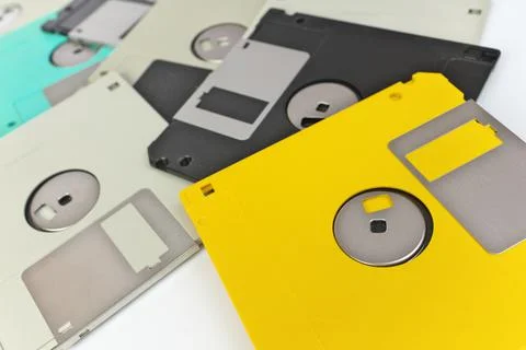 Full Frame Close up of 3.5 Inch Floppy disks for background. Retro digital Stock Photos
