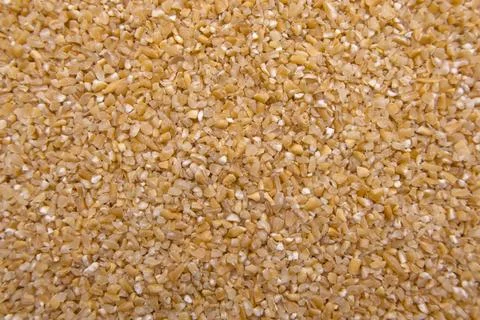 Full-Frame Close-Up of Broken Wheat (Dalia) - Cracked Wheat Texture Macro Stock Photos