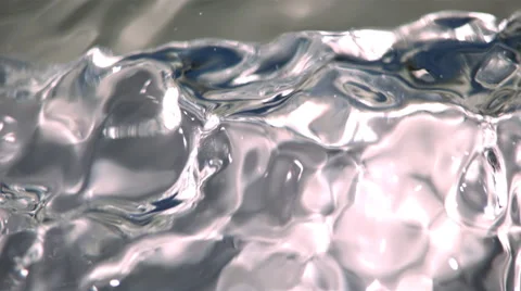 Full-frame close-up of clear water surging in ultra-slow motion Stock Footage 59527222