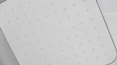 Full frame close up image of large square shower head Stock Photos