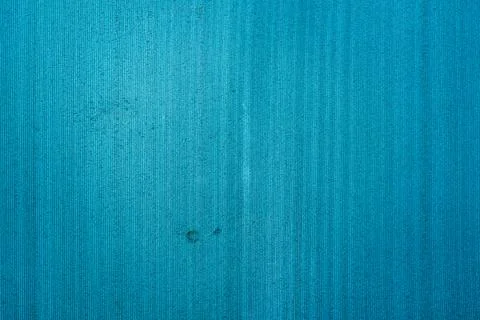 Full frame close up shot of bright blue woven fabric texture with fine vert.. Stock Photos