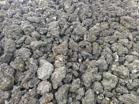 Full Frame Close Up Texture of Rough Volcanic Lava Rock Stones Background Stock Photos