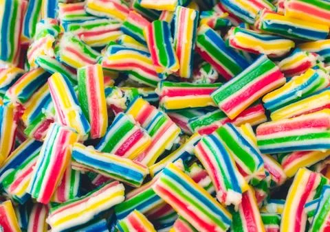 Full frame closeup of multi-colored candy chews / sweets Stock Photos