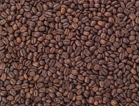 Full frame of coffee beans, abstract background. Stock Photos