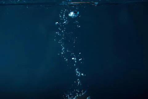 Full frame of dark water with bubbles background Stock Photos