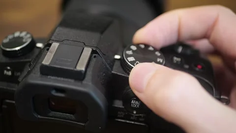 Full Frame Digital Camera Mode Dial Rotating with Precise Click Feedback for Stock Footage 321528730