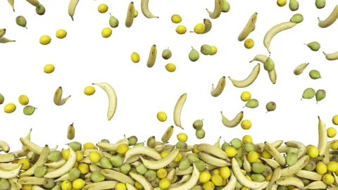 Full frame falling bananas pears and lemons on white background. Stock-Footage 274655124