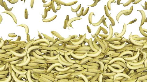 Full frame of falling bananas on white background. Video stock 274626837