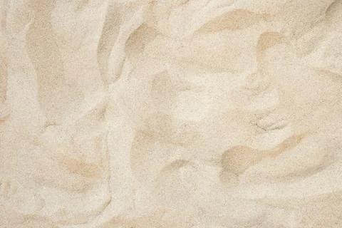 Full frame with fine sand on the beach and background texture. Stock Photos
