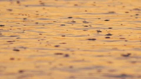 Full Frame Footage Of Sunlight Reflecting On Waves With Bubbles Stock Footage 79655210