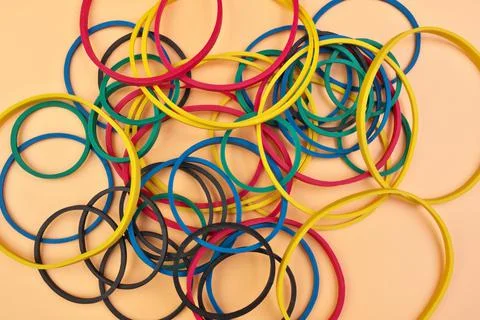 Full Frame Image Flatlay of Multicolored Elastic Rubber Bands on a Cheerful Stock Photos