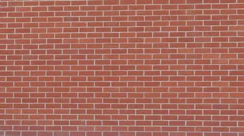 Full frame image of plain terracotta brick work suitable for use as wallpaper Stock Photos