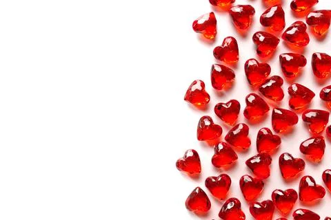 Full Frame Image of Sparkling Red Gemstone Hearts on a White Studio Background Stock Photos