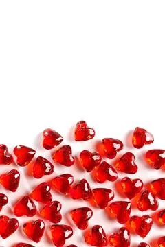 Full Frame Image of Sparkling Red Gemstone Hearts on a White Studio Background Stock Photos