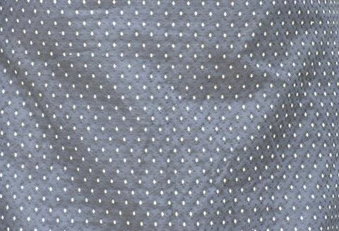 Full frame indigenous fabric pattern with white dots on a black background. Stock Photos