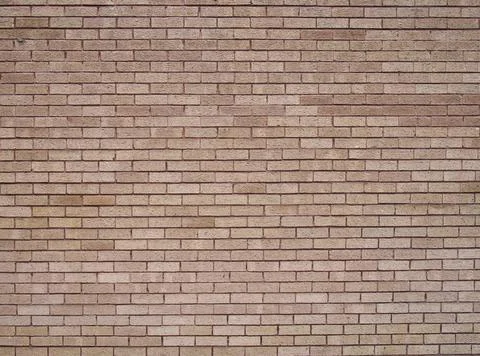  a full frame light brown textured brick wall background a full frame ligh... Foto stock
