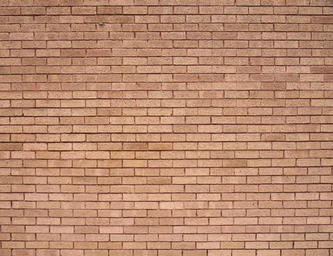  a full frame light brown textured brick wall background a full frame ligh... Stockfoto's
