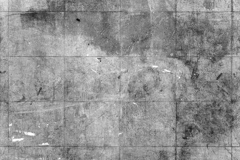 Full frame monochrome background texture of a weathered square tiled wall w.. Stock Photos