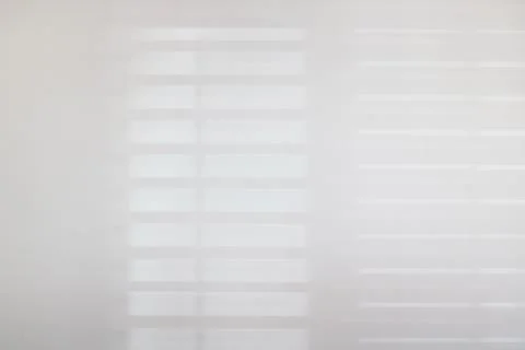 Full frame monochrome image of shadows cast by plantation shutters Stock Photos
