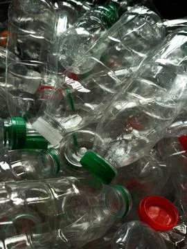 Full frame of new, empty transparent plastic bottles Stock Photos