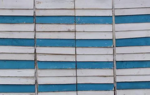 Full frame of old and worn blue and white wooden panelling Stock Photos