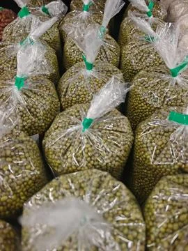 Full Frame Pattern of Dried Green Mung Beans in Retail Packaging Stock Photos
