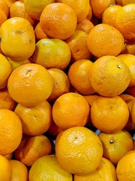 Full frame pattern of fresh ripe orange mandarins background Stock Photos